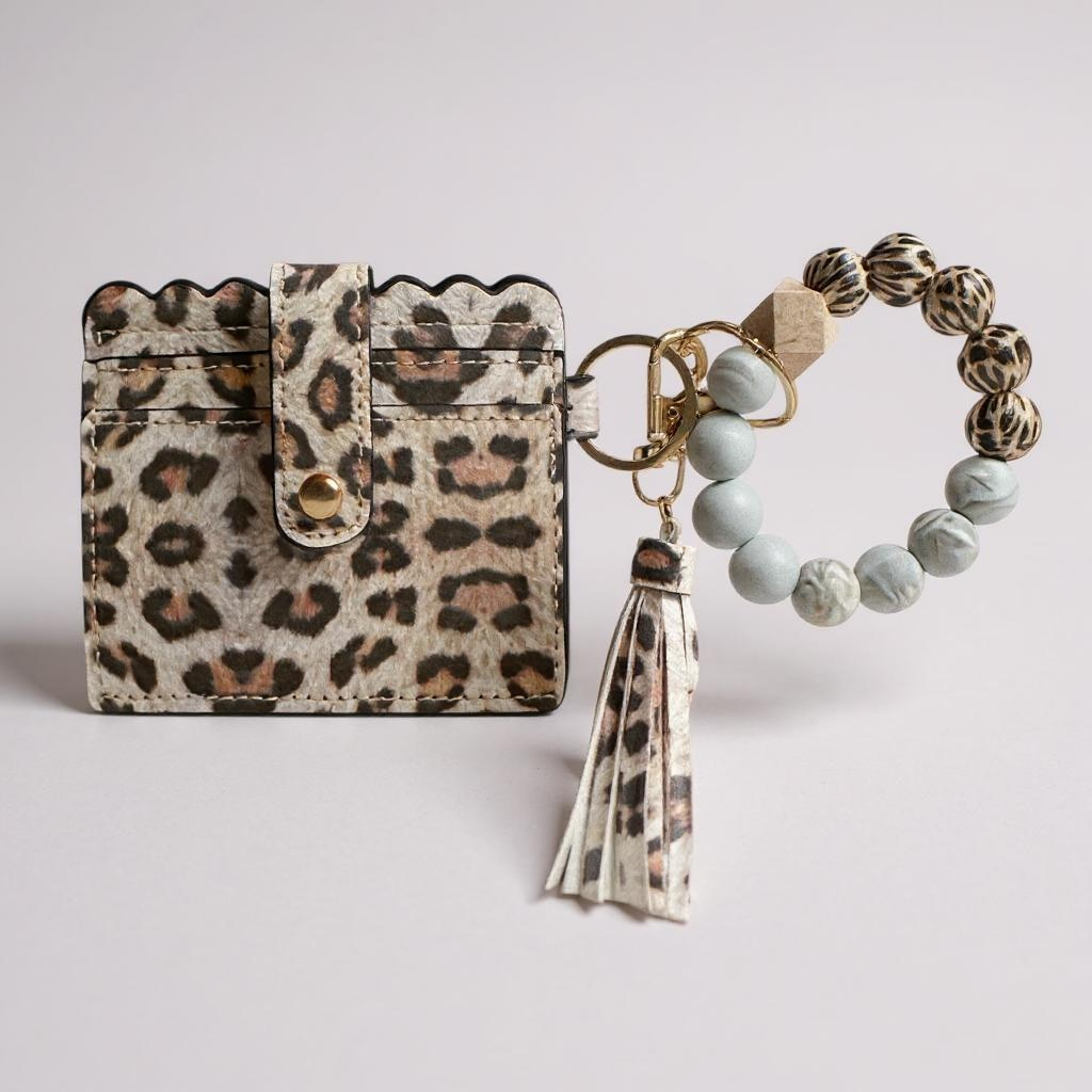 Leopard print cardholder, keychain with tassel, and bracelet