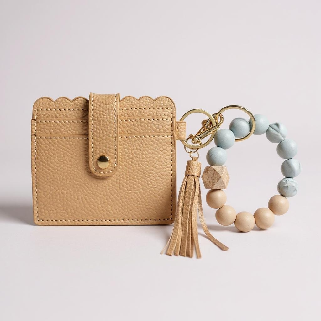 Beige cardholder with tassel, keychain protect her