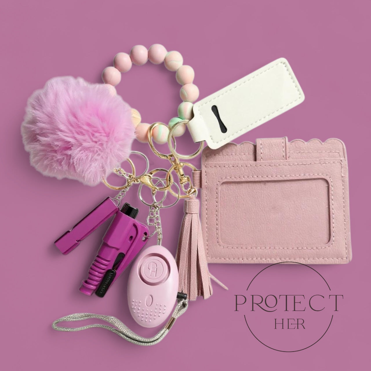 purple keychain with safety devices and a cardholder 