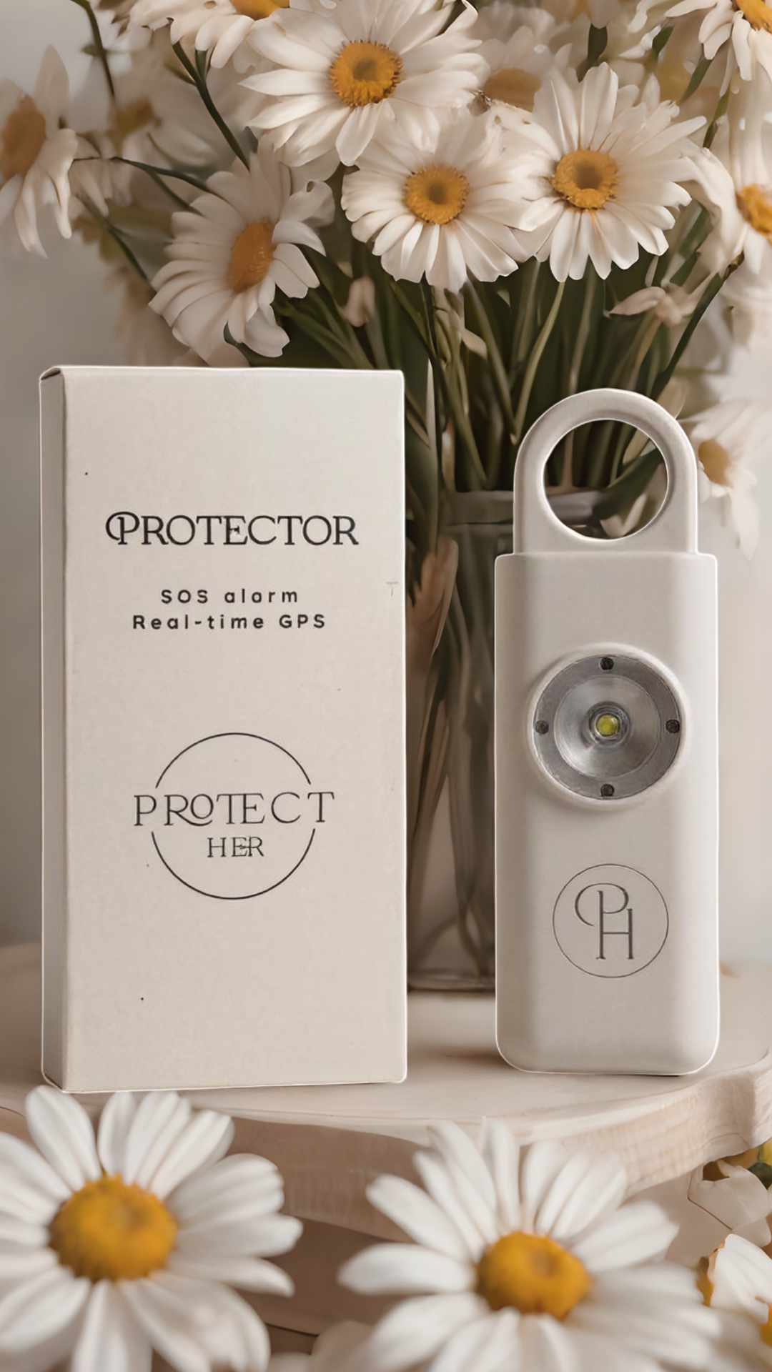 White 'Protector' SOS alarm with packaging front view